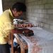 Yusri Hendri Tengah meCaps Motif Batik Tungku Tigo Sajarangan Khas kota Solok