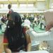 Salah seorang atlet melakukan vaksinasi