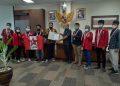 Foto bersama anggota GMNI Padang dengan Anggota Komisi IV DPRD Sumbar, Lazuaradi Erman