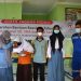 Semen Padang padang serahkan bantuan beasiswa dan pendidikan untuk pelajar Sei Sembilan, Kota Dumai, Provinsi Riau.
