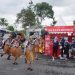 Telkomsel menjadi yang pertama menghadirkan jaringan 5G di Bumi Cenderawasih melalui showcase &apos;Telkomsel 5G Experience Center&apos; pada momentum PON XX Papua 2021 di Stadion Lucas Enembe Papua