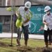 Plt. Direktur Utama  PT Semen Padang Asri Mukhtar,  menyiram pohon yang baru ditanam pada acara penghijauan di area Pabrik Indarung VI,  Senin (14/2/2022).  Pada 2022 ini, PT Semen Padang merencanakan menanam sebanyak 1000 batang pohon  di sekitar pabrik.