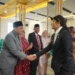 Bupati Annisa memberikan selamat kepada Kepala Badan Keuangan Daerah (BKD) Marten Yunus.