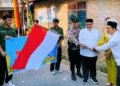 Muhidi, melepas pawai Katam Al-Qur’an perdana yang digelar TPQ-TQA Masjid Al Huda, Kelurahan Jati I, Kota Padang, Minggu (7/6/2026).