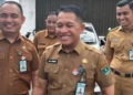 Kepala Bapenda Sumbar Al Amin, didampingi Ka Samsat Padang Defrizal dan Ka TU Samsat Padang Herry Pratama (ist)