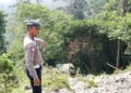 Truk box yang terjun ke jurang di kawasan Bukit Berbunga, Silaing Bawah, Padangpanjang, Minggu (13/9/2026). (Foto: Satlantas Polres Padangpanjang)