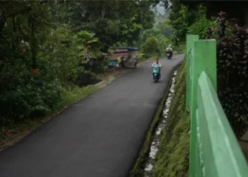 Mulusnya jalan Koto Tuo, Kapalo Koto, Kecamatan Pauh Kota Padang membuat aktivitas warga kembali normal (Dok: Tim Media Satgas PRR).